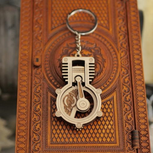Rotating Engine Piston Keychain